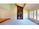 Bright living room with vaulted ceilings, exposed wood beams and marble fireplace at 611 Stowe Rd, Clover, SC 29710