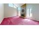 Bright and spacious living room featuring vaulted ceilings, a brick fireplace, and large windows at 611 Stowe Rd, Clover, SC 29710