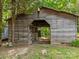 Rustic barn structure offers versatile storage and potential for various outdoor activities at 627 S Chapel St, Landis, NC 28088