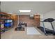 Basement gym area with work out equipment, exposed brick, and ample space for fitness activities at 627 S Chapel St, Landis, NC 28088
