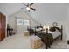 Bright bedroom with two twin beds, a ceiling fan, and natural light creating a welcoming space at 627 S Chapel St, Landis, NC 28088