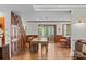 Elegant dining room adjacent to the kitchen and featuring wood paneling and natural light at 627 S Chapel St, Landis, NC 28088