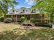 Charming two-story brick home with dormers and a welcoming front porch at 627 S Chapel St, Landis, NC 28088