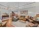 Expansive living room with a cozy sectional sofa and views of the staircase and upper level at 627 S Chapel St, Landis, NC 28088