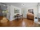 Study or office room featuring hardwood floors, a vintage desk, and a decorative painting on the wall at 627 S Chapel St, Landis, NC 28088