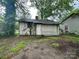View of the home's backyard and exterior, showcasing the potential for outdoor improvement and landscaping at 714 Douglas St, Shelby, NC 28150