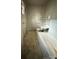 Simple bathroom featuring a classic tub, toilet, and sink, ready for an update at 714 Douglas St, Shelby, NC 28150