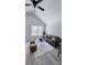 Cozy living room features high ceilings, neutral walls and flooring, a large window, and comfortable seating at 721 32Nd Ne St, Conover, NC 28613