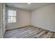 Bedroom with a window that provides ample sunlight and light wood flooring at 721 32Nd Ne St, Conover, NC 28613