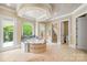 Luxurious main bathroom with jacuzzi tub, walk-in shower, and access to the beautiful outdoor spaces at 8451 Ridgewood Rd, Sherrills Ford, NC 28673