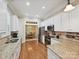 Bright kitchen with granite countertops, stainless steel appliances, and backyard views at 9640 Alma Blount Blvd, Charlotte, NC 28277