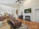 Open-concept living room with vaulted ceiling and view into the kitchen at 9640 Alma Blount Blvd, Charlotte, NC 28277