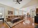 Bright living room featuring hardwood floors and an open floorplan at 9640 Alma Blount Blvd, Charlotte, NC 28277