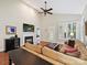 Spacious living room featuring a fireplace, TV, and comfortable seating at 9640 Alma Blount Blvd, Charlotte, NC 28277