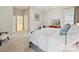 Serene bedroom with tray ceilings, soft carpet, and access to an ensuite bathroom at 9640 Alma Blount Blvd, Charlotte, NC 28277