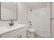 Updated bathroom with sleek sink and vanity, as well as tiled shower and bath at 106 Walters St, Huntersville, NC 28078