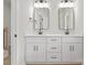 Modern bathroom featuring dual vanity with sleek black hardware and a neutral palette at 106 Walters St, Huntersville, NC 28078