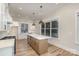 Well-designed kitchen with a central island, stainless steel appliances, and ample counter space at 106 Walters St, Huntersville, NC 28078