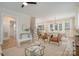 Elegant living room with an open layout, hardwood floors, and chic furnishings, ideal for modern living at 106 Walters St, Huntersville, NC 28078
