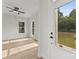 Inviting living area features an exterior door and ample natural light streaming through the windows at 106 Walters St, Huntersville, NC 28078