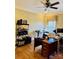 Bright office featuring hardwood floors, neutral walls, and functional desk area at 107 Cedar Lake Dr, Statesville, NC 28625