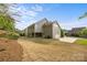 A spacious backyard with fresh sod, home, and attached garage is an excellent opportunity at 11304 Preservation Ln, Charlotte, NC 28278