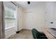 Bedroom featuring a window with blinds, a closet, desk and chair at 120 N Cardinal N Dr, New London, NC 28127