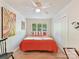 Bright bedroom featuring light-colored walls and floors, and natural light from multiple windows at 1278 Island Creek Dr, Troy, NC 27371