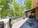 Wooden deck overlooking the lake with room for a grill and seating at 1278 Island Creek Dr, Troy, NC 27371