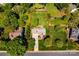 Aerial view of a home with a spacious yard and mature trees marked by a property line at 129 Morrison Cove Rd, Mooresville, NC 28117