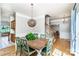 Charming dining room with hardwood floors, decorative lighting, and staircase to the upper level at 129 Morrison Cove Rd, Mooresville, NC 28117