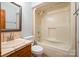 Bathroom featuring a single sink, tile flooring, and a shower/tub combination at 1376 Garland Ln, Lincolnton, NC 28092
