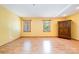 Bedroom featuring hardwood floors, natural light from two windows, and a closet unit at 1376 Garland Ln, Lincolnton, NC 28092