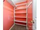 Walk-in closet with shelving and a rack and an adjacent light at 1376 Garland Ln, Lincolnton, NC 28092