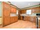 Bright kitchen with wood cabinetry, stainless steel appliances, and ample countertop space at 1376 Garland Ln, Lincolnton, NC 28092