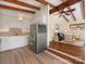 Modern kitchen with stainless steel appliances, light cabinets, and access to the living area at 1438 Larkfield Ln, Charlotte, NC 28210