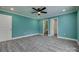Open bedroom with neutral walls, wood floors, access to the bathroom, and a walk-in closet at 1495 Memorial Park Rd # 10, Lancaster, SC 29720