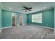Comfortable bedroom with neutral-toned walls, a window, and access to an ensuite bath and walk-in closet at 1495 Memorial Park Rd # 10, Lancaster, SC 29720