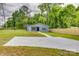 Exterior shot of a home showcasing a concrete drive and a fresh lawn at 1495 Memorial Park Rd # 10, Lancaster, SC 29720