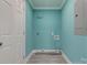 The interior view showcases room with turquoise walls and utility hookups for laundry at 1495 Memorial Park Rd # 10, Lancaster, SC 29720