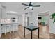 Open concept kitchen with stainless steel appliances and view to the living room at 1522 Stafford Ext, Monroe, NC 28110