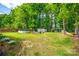 Large backyard with pool, storage shed, and room for activities at 1623 Mulberry Cir, Rock Hill, SC 29730