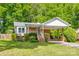 Charming brick home with a covered carport and well-manicured front lawn at 1623 Mulberry Cir, Rock Hill, SC 29730
