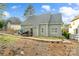 The backyard features a multi-level deck and green space perfect for outdoor enjoyment at 1688 Avalon Dr, Rock Hill, SC 29730