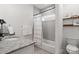 Bathroom featuring a tub with shower, granite countertops, and modern fixtures at 1688 Avalon Dr, Rock Hill, SC 29730