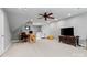 Expansive bonus room with office setup, neutral walls and carpet, and a cozy seating area for relaxation at 1688 Avalon Dr, Rock Hill, SC 29730