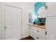 Hallway features a utility cabinet with butcher block top, white walls and a mirror at 1688 Avalon Dr, Rock Hill, SC 29730