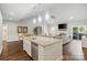 This open kitchen features a large island overlooking the living and dining area with stainless steel appliances at 1688 Avalon Dr, Rock Hill, SC 29730