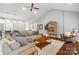 Open-concept living room with hardwood floors, vaulted ceilings, and comfortable seating, ideal for entertaining at 1688 Avalon Dr, Rock Hill, SC 29730