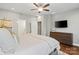 Cozy main bedroom boasts a ceiling fan, and an ensuite bathroom and walk in closet at 1688 Avalon Dr, Rock Hill, SC 29730